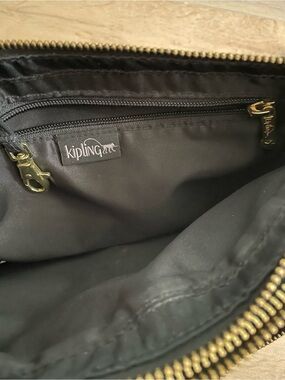 Kipling | Bags | Kipling April Crossbody Bag Black And Patent Leather ...